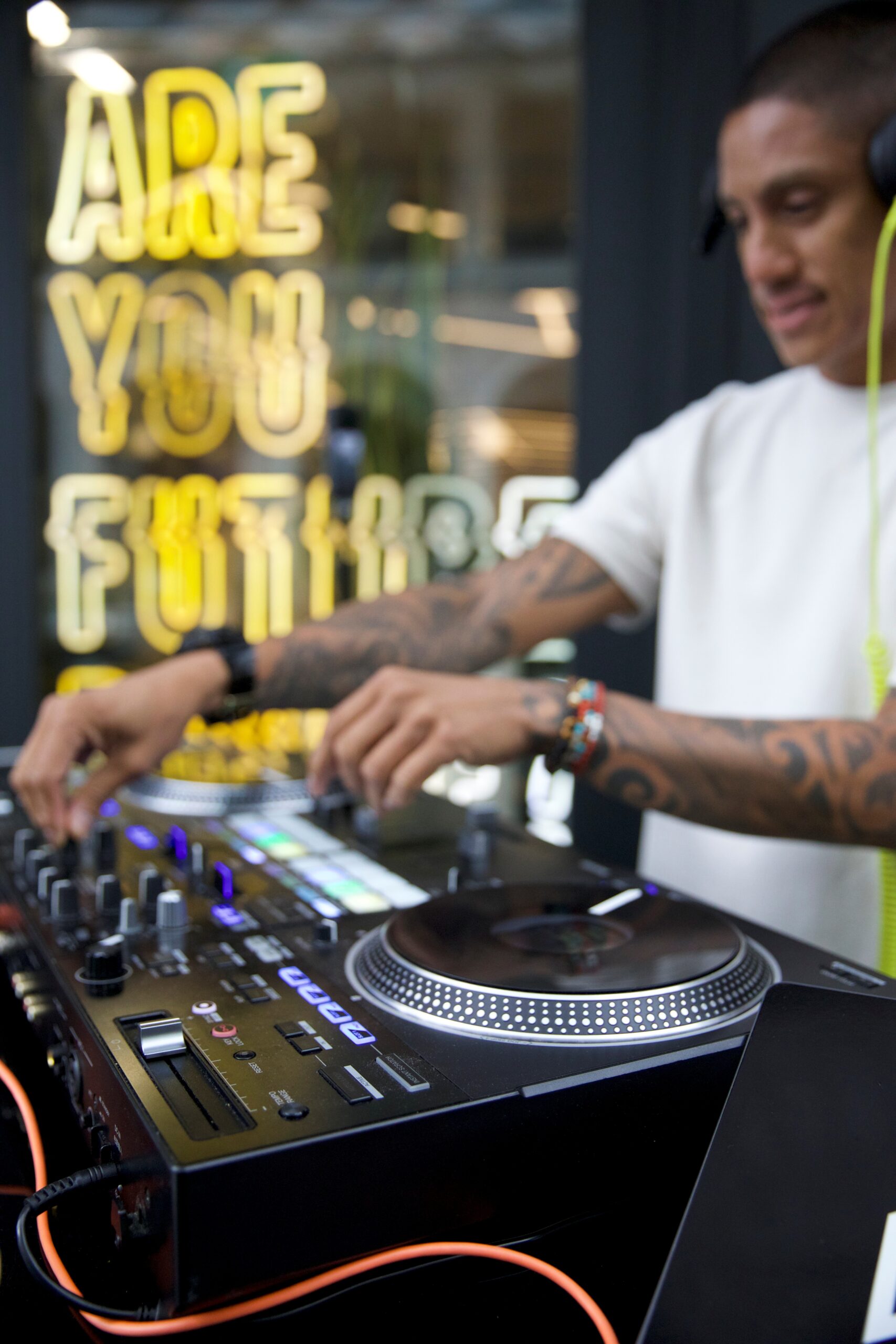 Man playing music in a networking event.